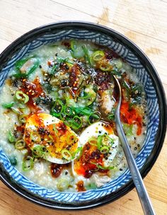 a bowl of oatmeal with eggs and vegetables