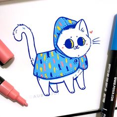 a drawing of a cat wearing a blue sweater and holding a pink ballpoint pen