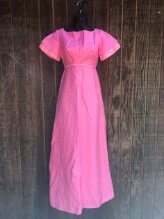 Pink Empire Waist Maxi Dress For Evening, Formal Pink Short Sleeve Maxi Dress, Pink Fitted Regency Style Dress, Regency Style Fitted Pink Dress, Pink Fitted Empire Waist Dress, Feminine Vintage Short Sleeve Wedding Dress, Feminine Short Sleeve Maxi Dress For Evening, Feminine Short Sleeve Maxi Dress For Formal Occasions, Formal Vintage Dress With Fitted Bodice And Short Sleeves