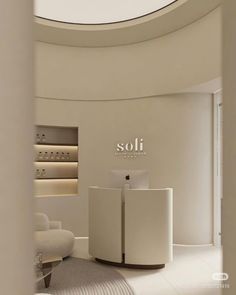 the interior of a store with white furniture