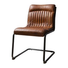 a brown leather chair sitting on top of a metal frame