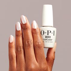 A white with pink and green pearlescense that'll unleash your magic! Follow the yellow brick road to a Wicked-ly beautiful holiday collection. Enchant nails with limited edition shades and in mani effects, including glow-in-the-dark. Elevate your style with OPI. This stunning, deep hue is formulated to endure for a minimum of two weeks post-application. With vibrant polishes and transformative treatments, it’s easy to see why OPI is the most sought-after brand in the industry. No matter which op Opi Gel Nails, Skin Care Salon, Red Carpet Manicure, Gel Lamp, Glitter Gel Polish, Liquid Nails, Gel Art, Glitter Nail Polish, Brick Road