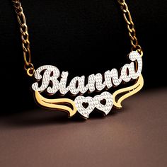 Details: This personalized double-layer two-tone name necklace features a heart pendant, expressing love and affection. Crafted from high-quality materials, it is durable, comfortable, and resistant to fading. Customize the name to make it unique, suitable for everyday wear or special occasions, and a perfect gift for loved ones. Key Points: 1. Personalized Design: Customize the name for a unique and individualized necklace, showcasing your personality. 2. Double-Layer Design: Double-layer chain Silver Custom Name Heart Necklace, Silver Heart Necklace With Custom Name Nameplate, Silver Heart Nameplate Necklace With Custom Name, Customized Gold Heart Name Necklace, Customized Gold Heart Nameplate Necklace, Gold Heart Nameplate Necklace, Gold Heart Nameplate Necklace For Anniversary, Gold Nameplate Heart Necklace, Gold Double Heart Name Necklace