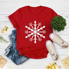 "Snowflake Christmas Shirt, Snowflake Tshirt, Christmas Shirt, Distressed Snowflake Shirt, Christmas Winter Shirt, Xmas Gift, Christmas Party Embrace the winter wonderland with our Snowflake Christmas Shirt. This charming snowflake design captures the magic of the season. It's not just a Christmas shirt; it's a celebration of the beauty that falls from the sky. With its distressed style, it adds a touch of nostalgia to your holiday wardrobe. Get ready to make a statement at your Christmas party with this Xmas gift-worthy tee. Let it snow! ❄️🎄❤️ #WinterWonderland Hi!  Welcome. It's great to see you here! ☺️ Our shirts are clean, high quality and soft. It is prepared quickly by our boutique.  Ironing and shipped.  Enjoy your shopping! It is a pleasure for us to help you with your questions Christmas Tee Shirts Blue, Cute Christmas Shirts Lightinthebox, Sholderless Christmas Shirts, Christmas Tshirts Vinyl Women, Womens Christmas Shirts Zazzle, Winter Tshirts Vinyl, Christmas Tops With Custom Print, Christmas Vinyl Shirts Teepublic, Snowflake Shirt