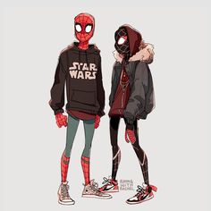 two people in spider - man costumes standing next to each other, one wearing a hoodie