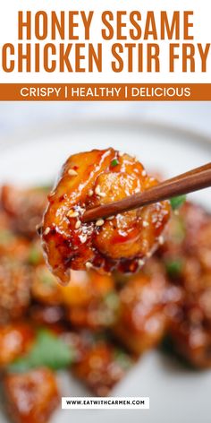 honey sesame chicken stir fry on a white plate with chopsticks in the foreground