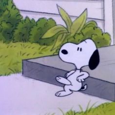 a cartoon dog is sitting in the grass