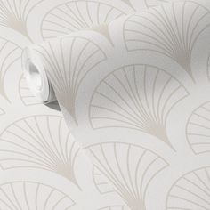 a white wallpaper with an intricate design on it's face and back side