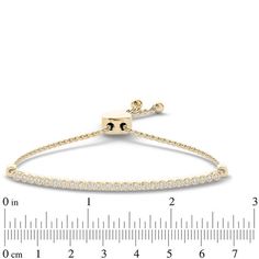 Beautifully stackable, this shimmering diamond bolo bracelet sizzles on its own or with other bolo styles. Crafted in sterling silver with 14K gold plate, this dazzling bar design features a long row of petite diamonds - perfect for adding sparkle to any look. Captivating with 1/10 ct. t.w. of diamonds and a brilliant buffed luster, this wheat chain bracelet adjusts up to 9.0 inches in length and secures with a bolo clasp and ball ends. Timeless Stackable Diamond Bracelet With Adjustable Fit, Adjustable Yellow Gold Tennis Bracelet, Timeless Adjustable Stackable Diamond Bracelet, Adjustable White Gold Diamond Bracelet For Everyday, Minimalist Adjustable Yellow Gold Tennis Bracelet, Adjustable Yellow Gold Tennis Bracelet With Diamond Accents, Adjustable 14k Gold Tennis Bracelet, Fine Jewelry, Adjustable Yellow Gold Bracelets With Prong Setting, Adjustable 14k Gold Tennis Bracelet