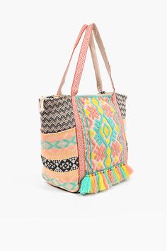 Have you ever wondered what it feels like to have your own personal rainbow accompanying you everywhere you go? Well, wonder no more! The Marbella Embroidered Tote is for those who like it subtle yet cheery, that sweet spot between these two widely different choices! This bag has a vibrant appeal with its luxurious patterned side panels, and rich hand embroidered detail in the front in pastel hues of coral. Versatile enough to be carried around just about anywhere, this bag is also effortless to Multicolor Embroidered Tote Bag For Vacation, Multicolor Embroidery Tote Bag For Vacation, Multicolor Embroidered Shoulder Bag For Summer Travel, Travel Shoulder Bag With Multicolor Embroidery For Summer, Cute Multicolor Shoulder Bag For Travel, Multicolor Embroidered Tote Beach Bag, Multicolor Embroidered Vacation Bag, Green Embroidered Vacation Bags, Multicolor Embroidered Travel Bag