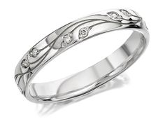 a white gold wedding ring with diamonds