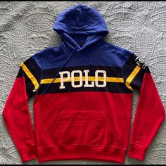 Polo Ralph Lauren Women's Long Sleeve P-93 Collection Patch Fleece Hoodie Retail $398 Polo Performance Color: Blue, Red, Yellow Body/Shell: 60% Cotton 40% Polyester Blue Drawstring Collar Kangaroo Pocket Chest With White Polo Graphic P-93 Ralph Lauren Established”67 Patch On Sleeve Ribbed Cuff And Hem Size: Small Sleeve Length: Long Red Casual Sweatshirt With Logo Detail, Casual Red Sweatshirt With Logo Detail, Red Long Sleeve Sweatshirt With Logo, Sporty Red Color Block Sweatshirt, Blue Hoodie With Logo Detail, Blue Hooded Sweatshirt With Logo Detail, Casual Blue Hoodie With Logo Detail, Blue Long Sleeve Hoodie With Logo Detail, Casual Blue Hoodie With Logo