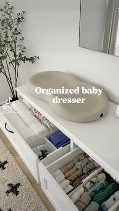 an organized baby dresser is shown in this image