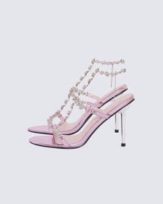 Keep your heels, head, and standards high 👑 With a classy, yet playful look - these pink jewel stilettos are complete with a 4.5" heel, a metallic pink sole, and an adjustable ankle strap creating the perfect statement piece to add to any fit that needs a little something extra 💖 Pink Open Heel Prom Heels, Pink Glamorous Heels For Night Out, Glamorous Pink Heels For Night Out, Glamorous Pink Heels For Party, Glamorous Pink High Heel Sandals, Pink Ankle Strap Sandals For Prom, Pink Party Sandals With Padded Heel, Pink Sandals With 4-inch Heel For Evening, Pink Heel Strap Sandals For Prom