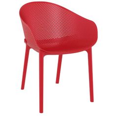 a red plastic chair with perfored back and legs, viewed from the side