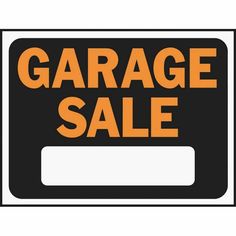 an orange and black garage sale sign