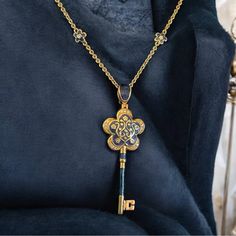 Add Some Spooky Charm To Your Jewelry Collection With This Lauren G Adams Gold Crystal Fun Skeleton Key Heart Necklace. The Pendant Features A Heart-Shaped Crystal In A Navy Blue Color, Hanging From A 31-Inch Gold Chain. The Necklace Is Perfect For Making A Statement With Its Unique Design And Charm Style. The Necklace Is A Great Addition To Any Fashion Jewelry Collection And Is Perfect For Adding A Touch Of Halloween Spirit To Your Outfit. The Lauren G Adams Brand Is Known For Its Quality And S Key Heart, Skeleton Key, Halloween Spirit, Gold Crystal, Navy Gold, Navy Blue Color, Stylish Jewelry, Heart Necklace, Blue Gold