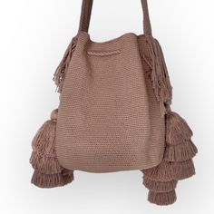 Unique crochet bag for tassel lovers! Neutral tones are always classic and fashionable. Pair this casual crossbody bag with your favorite every day outfit. Wear it as a crossbody or shoulder bag. This stunning boho chic style bag is perfect for a casual day, or as as a beach/pool accessory. It's a perfect piece to add flair to any look with its beautiful crochet details. Show off your style with the Double Tassel Bag. Details: Bucket Style Hand Crocheted Bags Matching one-thread hand-loomed stra Crochet Boho Bag, Crocheted Bags, Casual Crossbody Bag, Boho Chic Style, Bag Details, Crochet Decoration, Boho Bags, Tassel Bag, Pool Accessories