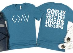 Professionally Printed. Unisex in sizing. We recommend staying in your typical tee size for a loose/relaxed fit. Size down if you prefer your graphic tees to be more form fitted. Please allow 14 business days for fulfillment as each graphic tee/sweatshirt is made to order. God Highs And Lows Tattoo, God Greater Than Highs And Lows, God Is Greater Than The Highs And Lows Jewelry, I’m Greater Than My Highs And Lows, God Is Greater Than The Highs And Lows Shirt, Georgia Fashion, Holiday Tops, Judy Blue Jeans, Greater Than