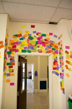 the hallway is decorated with colorful post it notes