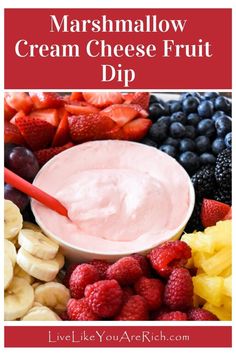 a bowl of cream cheese fruit dip surrounded by berries, bananas and strawberries with text overlay that reads marshmallow cream cheese fruit dip