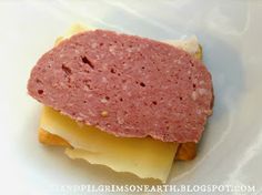 a sandwich with cheese and meat on it