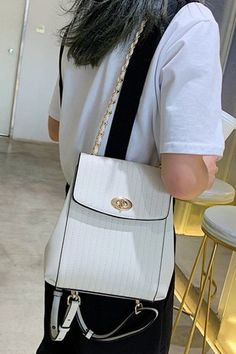 Beautiful Elegant White backpack purse convertible. This cute faux leather fashion bag is good for casual simple everyday wear White Leather Shoulder Backpack For School, White Leather Backpack For Daily Use With Large Capacity, Large Capacity White Leather Shoulder Backpack, Elegant School Backpack With Detachable Strap, White Leather Shoulder Backpack For Daily Use, White Backpack Satchel For Travel, White Satchel Backpack For Travel, White Rectangular Leather Backpack For School, White Large Capacity Backpack Satchel