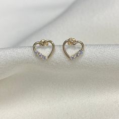 Ioka - Real 14K Yellow Gold Cubic Zirconia Heart Tiny Dainty Screw Back Stud Earrings ✅SHIPPING CONTENTS: ➤Pair of 14K Earring Studs ➤Jewelry Box ✅ PREMIUM 14K GOLD: Our jewelry is crafted from durable high quality materials, gems, and stones; hand-stamped for authenticity as well as FTC law approved. Unlike cheap costume jewelry, our long lasting jewelry is easy to polish and and won't permanently tarnish or rust! ✅Ioka Jewelry is a family-owned online business located in the heart of the Jewel Stud Jewelry, Earring Studs, Gold Necklace Layered, Solid Gold Jewelry, Downtown Los Angeles, Small Pendant, Gold Chain Necklace, Cz Stone, Jewelry Earrings Studs