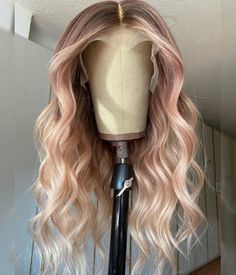 Our colorist line will be full of one-of-a-kind colors, hand-dyed by one of our top US colorists. They are perfection! Color Description: Cool level 7/8 base/roots that blend into a dimensional rose gold level 9 champagne blonde balayage with pink tones • Cap Construction: Lace Front Cap • Cap size: Medium 22”-22.5” • Length: 22” • 130% density • Slightly bleached knots *Please be aware that our colorist collection is not eligible for any discounts*   Disclaimer ** Our colorist created wigs, skillfully designed by our talented colorists, are exquisite works of art. Each piece is thoughtfully processed to achieve the unique, custom look you desire. However, it's important to note that due to the bleaching process involved, there may be occasional drawbacks - The lifespan of these wigs is sh Dimensional Pink Hair, Pink Balayage Blonde, Balayage With Pink, Blonde Balayage With Pink, Pink Toned Blonde Hair, Champagne Blonde Balayage, Pink Balayage, Pink Wonderland, Rose Gold Balayage