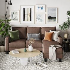 a living room filled with lots of furniture and pictures on the wall above it's coffee table