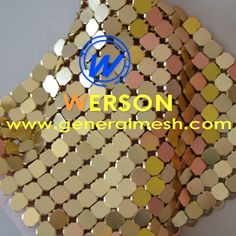 gold and pink mosaic tiles are stacked on top of each other