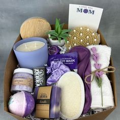 My gift boxes make the perfect gift! Each box measures 10"x10"x6", is tied with a purple ribbon and is ready to give as a gift to that special person. Gift box includes: (1) 12 oz natural, hand poured, soy candle in purple ceramic jar with wooden lid in lavender sage scent (1) custom box of matches (1) 4 oz jar of lavender bath salt (1) 5 oz lavender bath bomb (1) bar of lavender handmade soap (1) purple hair scrunchie (1) loofah pad (1) purple eye mask (1) steam eye mask (1) white washcloth wit Body Exfoliator Brush, Gift Box For Mom, Mom Greeting Card, Handmade Lavender Soap, Wrapping Inspiration, Purple Ceramic, Lavender Bath Salts, Relaxing Night, Gift For Mom Birthday