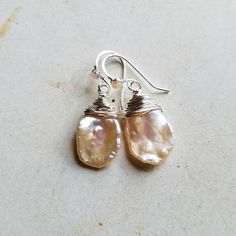 "Made to order. The first five pictures are in gold filled. The sixth and seventh are in sterling silver, are the eighth and ninth are in rose gold. The last picture shows all three styles. ~ pale peach keishi pearls, peach moonstone ~ gold filled, sterling silver, or rose gold filled wire and ear wires ~ approximately 1 1/4 inches (3.2 cm), from the top of the ear wire to the bottom of the pearl ~ POSTS: Sterling silver, gold filled, or rose gold filled posts are also available. Send me a messa Peach Pearl Drop Jewelry For Gift, Peach Colour Earrings, Handmade Peach Dangle Jewelry, Elegant Peach Dangle Earrings, Peach Round Gemstone Jewelry, Mint Earrings, Pale Peach, The Last Picture Show, Druzy Earrings