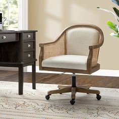 an office chair sitting in front of a desk with a potted plant on it