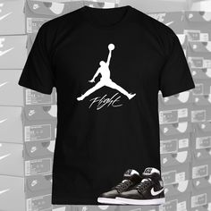 Air Jordan sneaker match t-shirt to wear with your favorite Jordan's or sneakers. Custom made to order.  Graphic T shirt  To match Air Jordan's Shoes not sold with Tees  Direct To Garment and High heat vinyl transfer Printing   This classic unisex jersey short sleeve tee fits like a well-loved favorite. Soft cotton and quality print make users fall in love with it over and over again. These t-shirts have-ribbed knit collars to bolster shaping. The shoulders have taping for better fit over time. Athletic Fit Crew Neck T-shirt For Streetwear, Black T-shirt With Screen Print For Sneaker Matching, Black Casual T-shirt With Athletic Fit, Sporty T-shirt For Streetwear, Sporty Comfortable T-shirt For Streetwear, Sporty Comfort Fit T-shirt For Streetwear, Comfortable Sporty T-shirt For Streetwear, Casual Graphic Print T-shirt For Light Sports, Crew Neck T-shirt With Logo For Sports