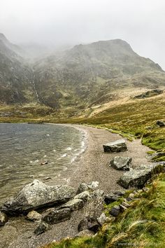 a rocky beach on the side of a mountain