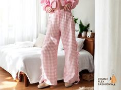 Elevate your wardrobe with our Gingham Side Tie Linen Pants, designed for a perfect blend of comfort and style. Crafted from lightweight linen, making them ideal for relaxed outings. The side tie detail adds a charming touch, while the ruffle hem provides a playful flair. With a relaxed fit, these trousers ensure easy movement, allowing you to enjoy your day with confidence. Pair them with a casual top or a stylish blouse for a complete look that's perfect for any occasion. 🌼✨ 📏 Size Notice: The size chart is smaller than the regular size. Please add 2-3 cm to your measurements when selecting your size to ensure the perfect fit. 🔄 Refund & Returns: We accept refunds if the item arrives defective, up to 7 days from the date of delivery. Please note that we do not accept returns for size- Patterned Trousers, Side Pants, Enjoy Your Day, Stylish Blouse, Casual Top, Linen Pants, Ruffle Hem, Trousers Women, Casual Tops