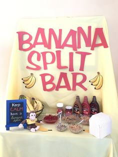 a banana split bar is set up on a table