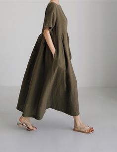 Sku CY-!121397 Material Cotton-blend Style Loose Feature Solid Color Neckline Round Occasion Going out , Casual , Vintage Seasons Spring, Summer, Autumn Type Maxi Dress Color Navy, Army Green, Apricot Size S, M, L, XL Size Chart: Please consult the size chart we provide for this item's measurements to help you decide which size to buy. Please note: There may be 1-3cm differ due to manual measurement. CM Bust Shoulder Sleeve Waist Hip Thigh Length One size / / / / / / / S 104 41 / / / / 118 M 108 Outdoor Dress, Loose Midi Dress, Summer Linen Dresses, Linen Midi Dress, Short Sleeve Maxi Dresses, Flowy Maxi Dress, Round Neck Dresses, Midi Short Sleeve Dress, Maxi Dress With Sleeves