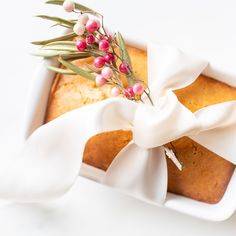 a loaf of bread with a bow tied around it