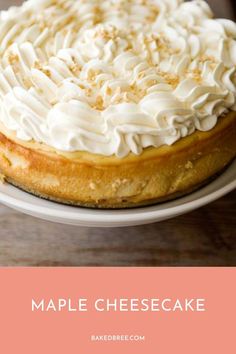 a cheesecake on a plate with the words maple cheesecake written in front of it