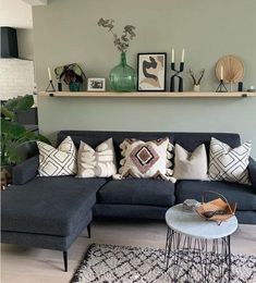 a living room filled with furniture and decor