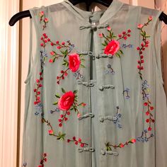 Vintage Beautiful Aqua With Embroidered Flowers Long Tunic/ Dress Under Slip Included Originally Purchased At Dillard’s 20 Years Ago. Never Worn Spring Sleeveless Embroidered Dress, Sleeveless Embroidered Dress For Spring, Spring Sleeveless Dress With Intricate Embroidery, Luxury Floral Embroidered Tunic Dress, Red Embroidered Tunic Dress, Embroidered Long Sleeve Blue Tunic, Embroidered V-neck Tunic For Spring, Vintage Embroidered Tunic Dress, Long Tunic Dress