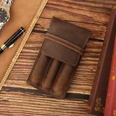 Genuine Leather Pen Case For Business Remarkable Leather Pen Holder Retro Stylus Case Writing Pen Pocket Bag Carry out PRODUCT INFORMATION MATERIALS: Made OF 100% Crazy Horse Leather Size&Weight: ▶Height: 15.5cm (6.1 inch) ▶Width: 8.6cm (3.4 inch) ▶Depth: 2cm (0.8 inch) ▶Weight: 49g ☞All dimensions are measured manually with slight deviation. Thank you for your understanding. My Other Style Leather Pen Cases:  1 Slots: https://etsy.me/3RHAfE1 2 Slots: https://etsy.me/3RPV6oP ✍From quills to pens to stylus, no matter how the world changes, every era needs a pen. For us, the pen is not just a tool, but a friend as well. It accompanied us through the difficulties and recorded our ordinary daily life. We hope to protect these friends and provide them with a comfortable home. ✎FEATURES ▶The ext Brown Pencil Case Pouch With Pen Slots, Brown Travel Pencil Case With Pen Holders, Travel Pencil Case With Card Slots, Brown Organizer With Pen Slots For Daily Use, Rectangular Organizer With Pen Slots For Gift, Rectangular Organizer With Pen Slots As Gift, Brown Rectangular Organizers With Pen Slots, Rectangular Organizers With Pen Slots As Gift, Brown Rectangular Organizer With Pen Slots