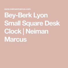 the small square desk clock is shown in white and has text that reads bevy - bert