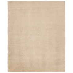 a beige rug on a white background with no one in the room to see it