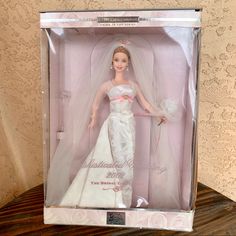 a barbie doll in a wedding dress and veil