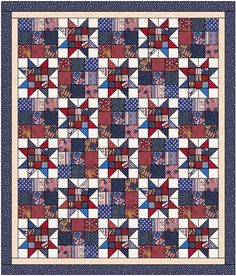 a quilt made with red, white and blue squares