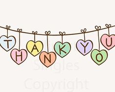 many hearts are hanging on a line with the words thank you written in different colors