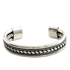 Finely crafted cords embrace a wide rope of sterling silver. Stylish and modern, this bold cuff bracelet is handcrafted by Yuniati in Bali.Product Features Combination finish Product Dimension: 6" L (end to end) x 0.6" W Product Weight: 0.0726 Material: 925 sterling silver Color: Silver Country of Origin: Indonesia Sto Ring Pandora, Mens Ring Designs, Cuff Bracelets Handmade, End To End, Sterling Silver Cuff Bracelet, Bridal Bracelet, Hippie Jewelry, Silver Jewelry Handmade, Sterling Silver Cuff